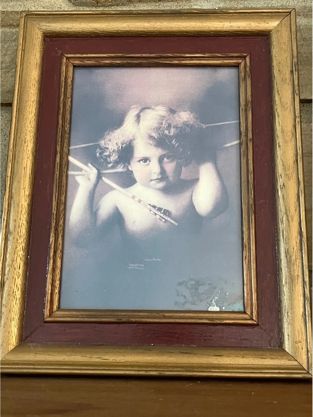 Pair of Vintage Framed Prints Featuring Cherubic Children with Arrows in Gold-Tw